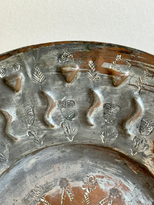 Metal Plate With Flora and Squiggle Motifs